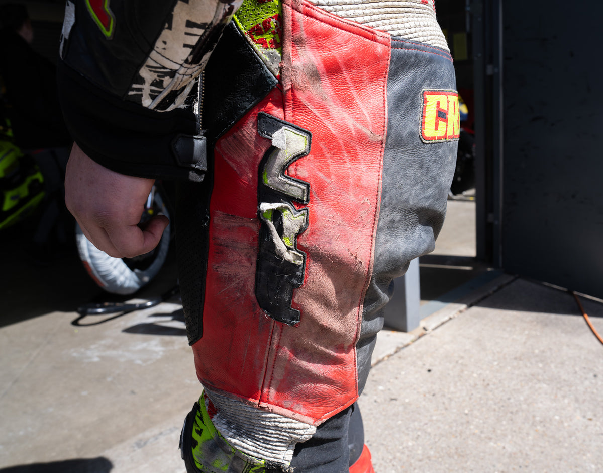 Andy DiBrino with race bike and tire warmers
